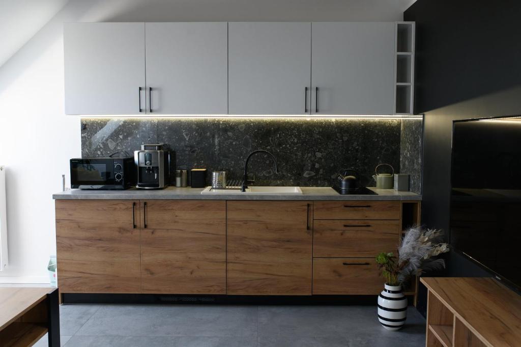 white concrete building near green grass field during daytime