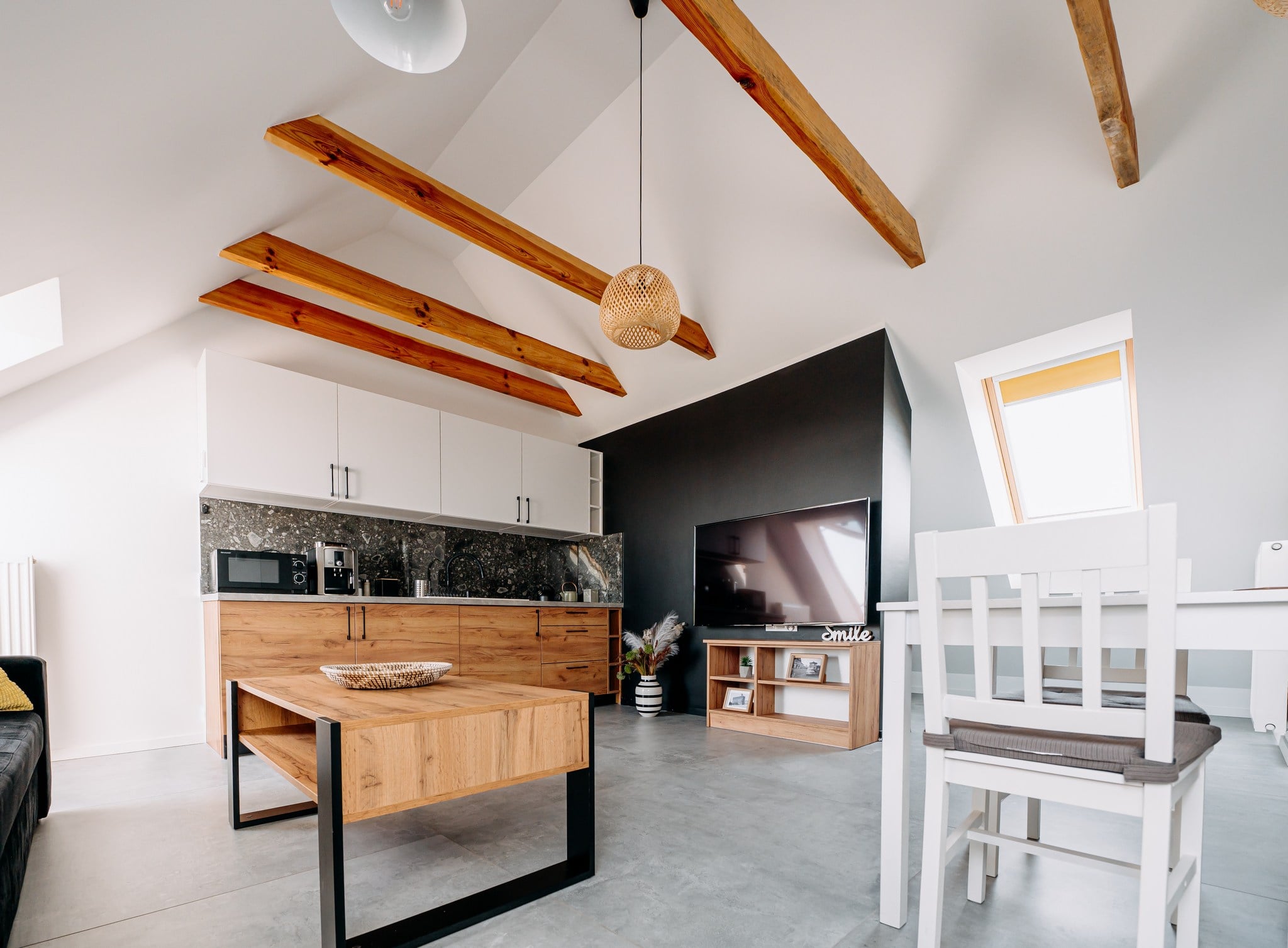 white concrete building near green grass field during daytime